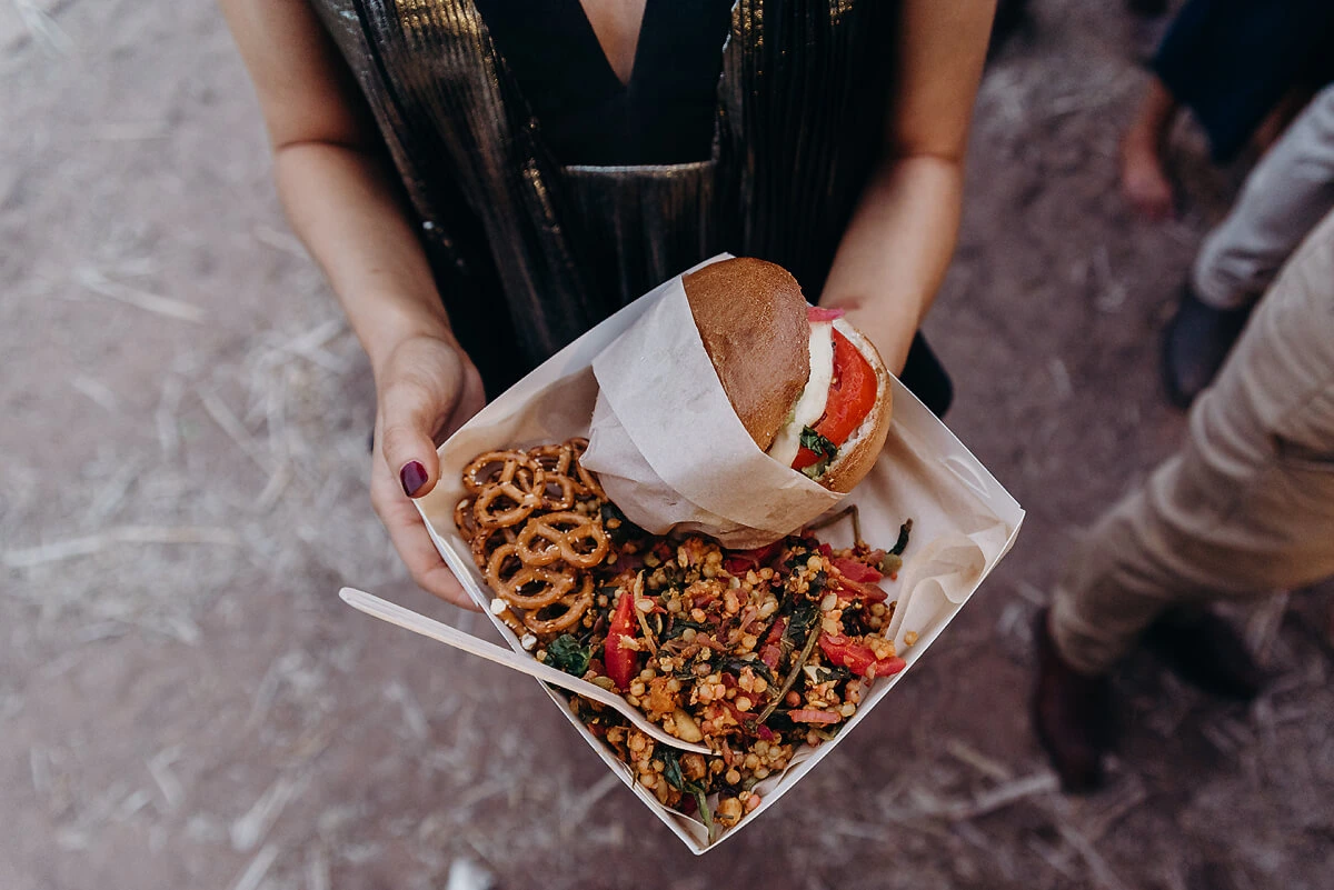 Cooked fresh from our food truck - Signature bagel box catering - Reuben bagel with potato salad, Slaw, pickles and pretzels