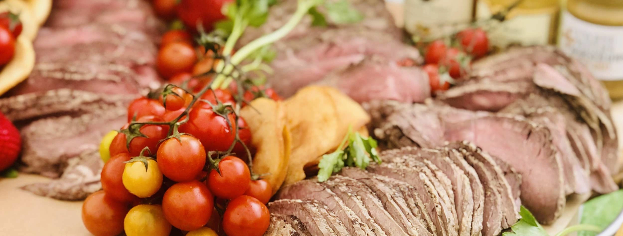 House made Rare roasted beef, local cherry tomato, selection of mustards - featured on our grazing table